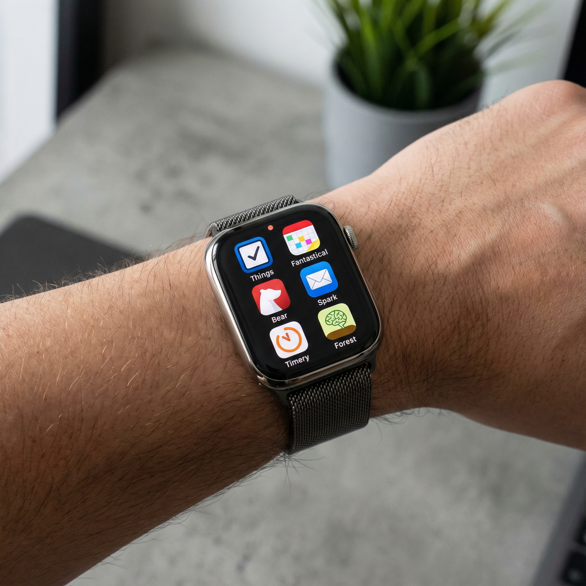 An Apple Watch display with icons of various productivity apps like a to-do list, calendar, and note-taking app. The watch is on a wrist with a clean, modern background, high contrast, and balanced lighting. No visible text, 1:1 aspect ratio.